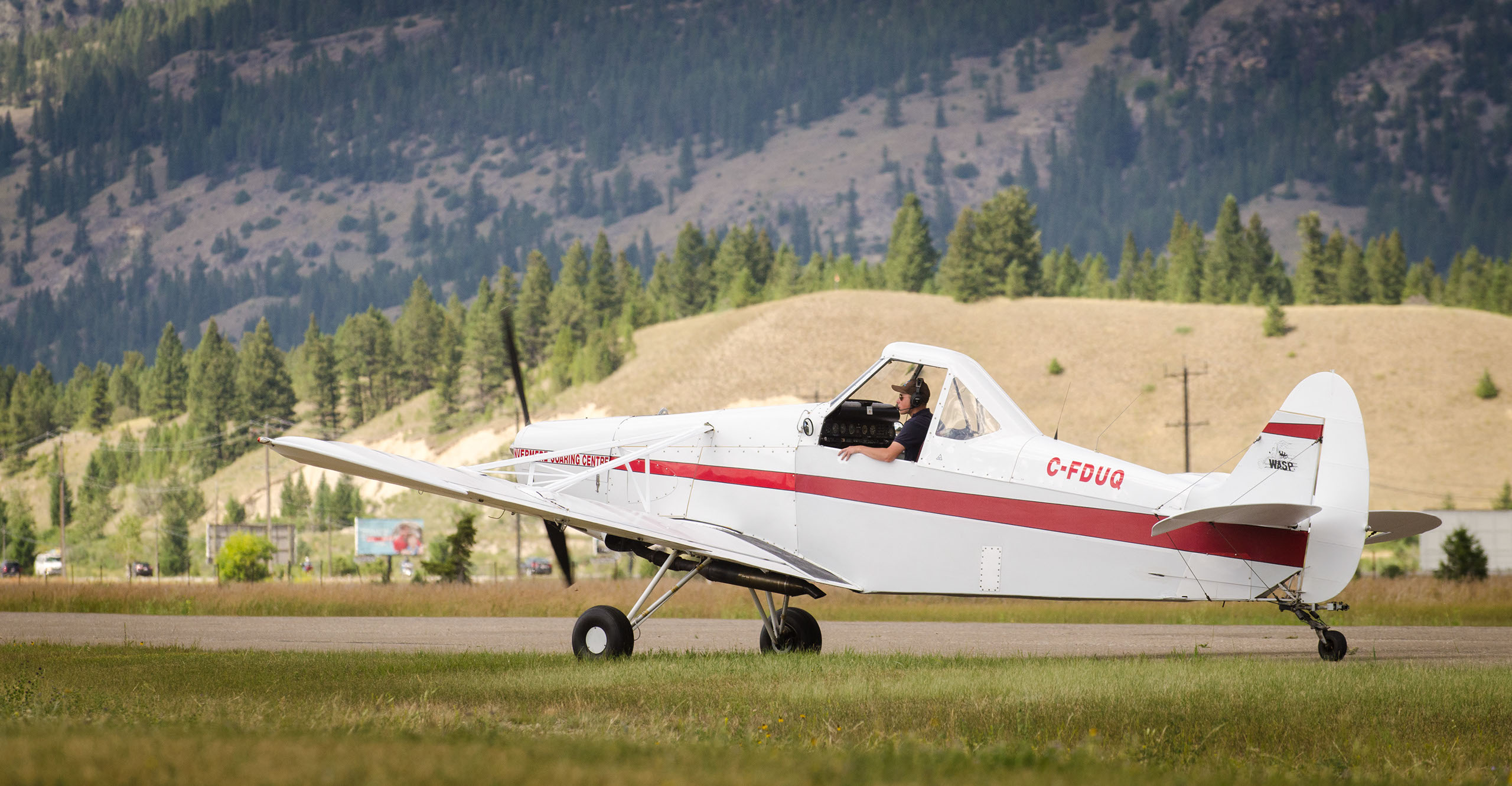 Glider against the Rocky Mountain backdrop